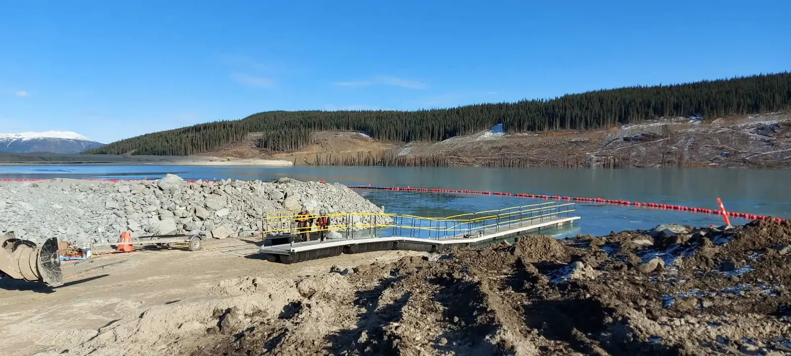 Xrosswater walkway with yellow handrails on open water